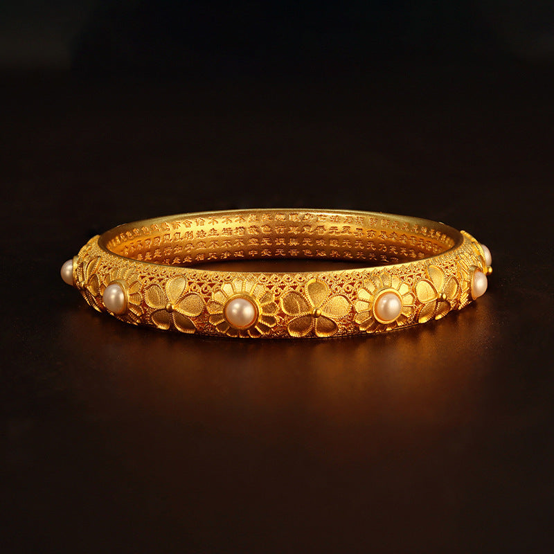gold bracelet with pearls