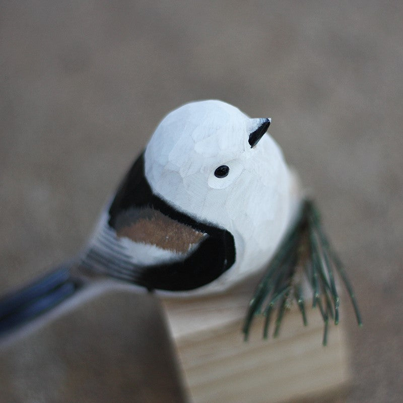 northern long tailed tit wood carving