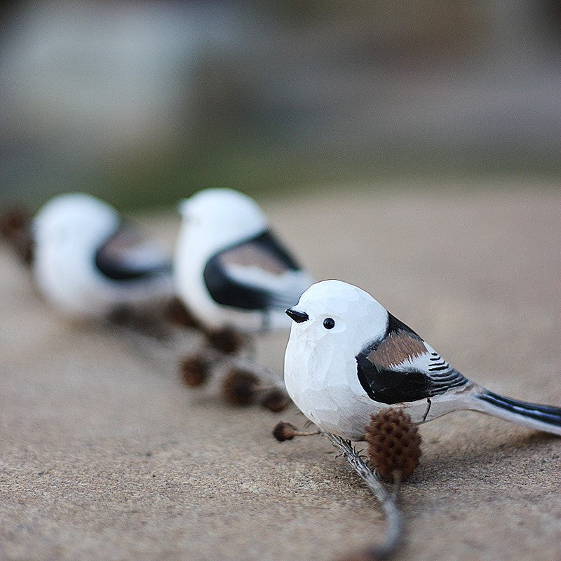 northern long tailed tit wood carving