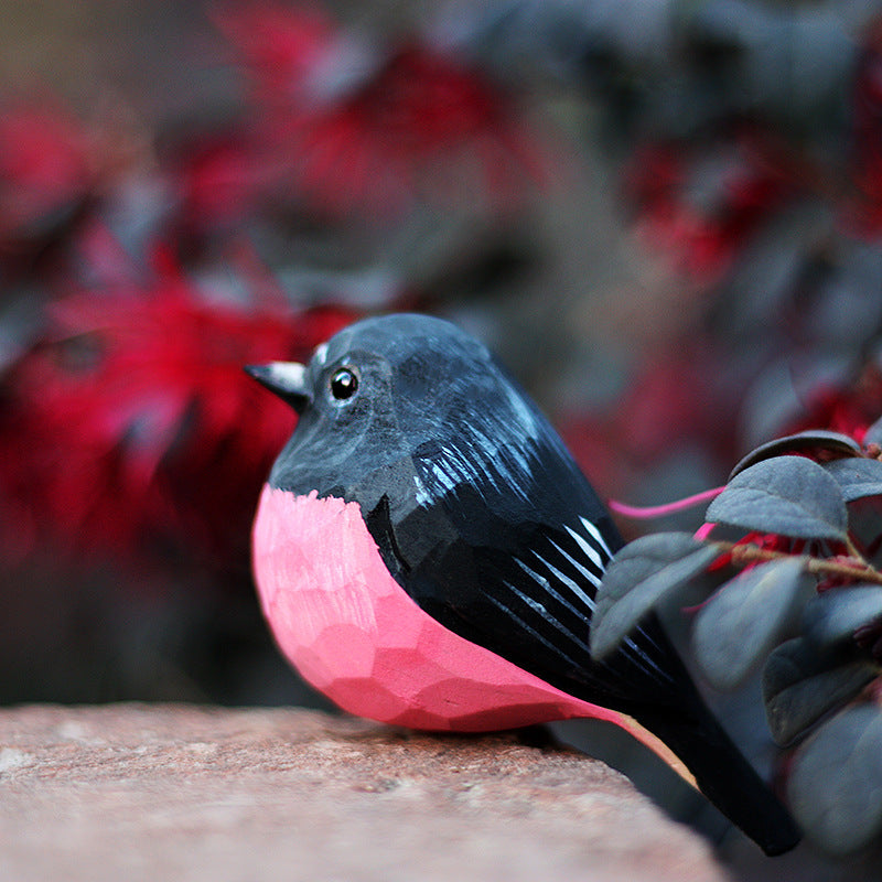 pink robin woodcarvings