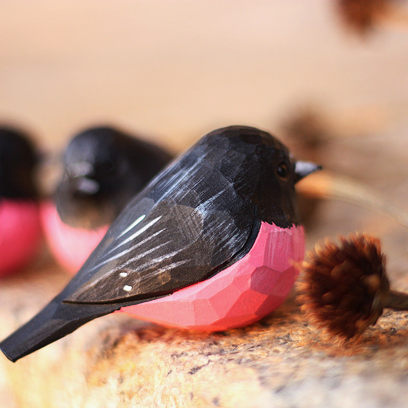pink robin wood carvings