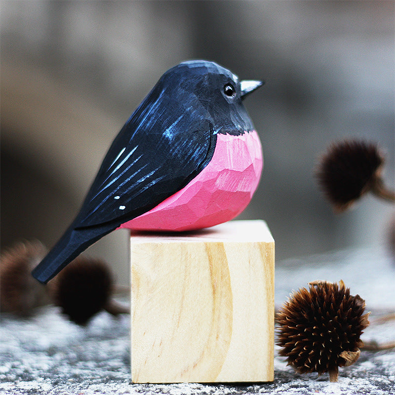 pink robin wood carvings
