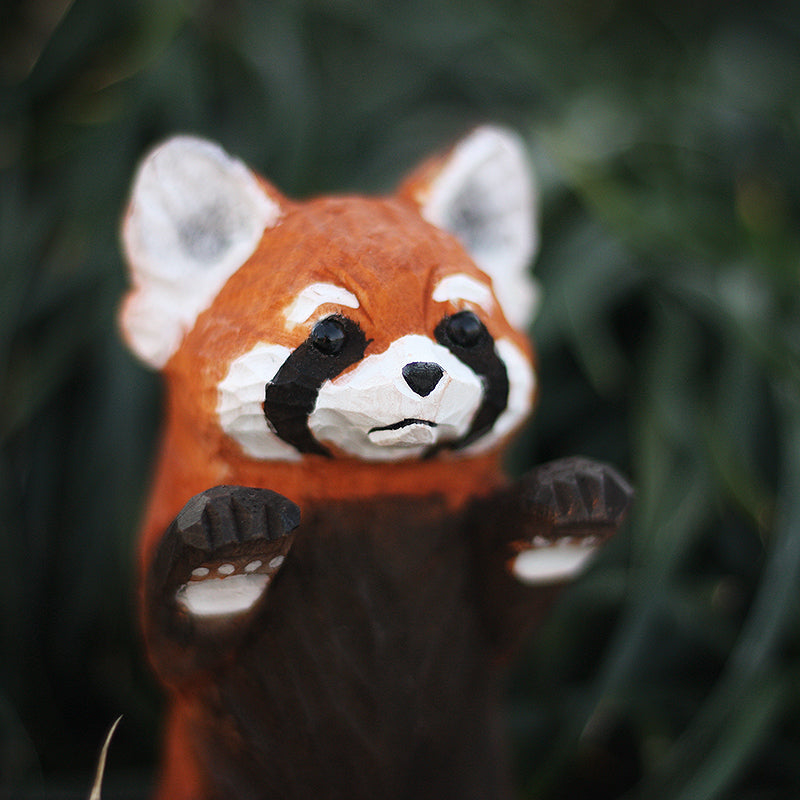 red panda wood carving