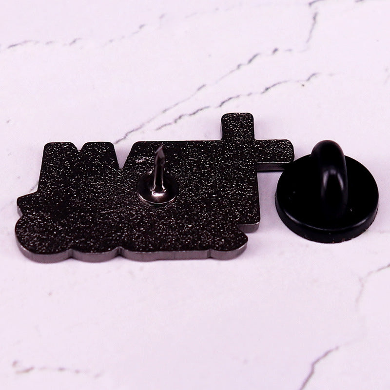back of team jesus brooch